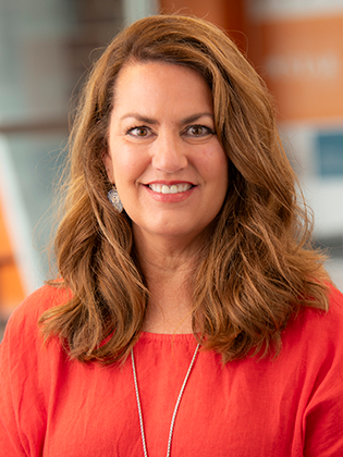 A person in front of a background.