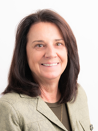 A person in front of a background.